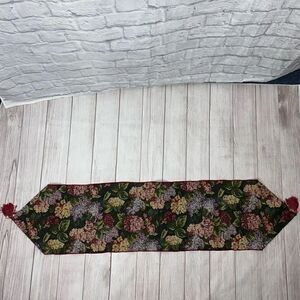 Floral print table runner with fringe ends approx 
52”x12.5”